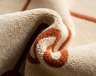 Tappeto in lana avorio trapuntato a mano, tappeto moderno con bordo in terracotta, tappeto geometrico di lusso