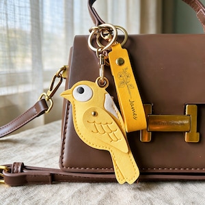 Custom Bird Airtag Keychain | Personalized Birth Flower & Name Leather Bag Charm Gift