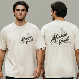 May include: Cream-colored t-shirt featuring a black graphic of a person with glasses and the text "Mockup Vault Studio." The design is on the front and back of the shirt. The shirt is a relaxed fit.