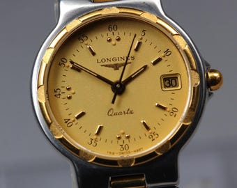 Near MINT LONGINES Conquest L152.2 152.4937 Date Gold Quartz 24mm Ladies Watch