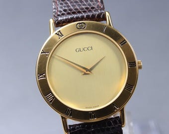 Near MINT GUCCI 3000.2.M Gold Roman GP Quartz 33mm Men's Dress Elegant Watch