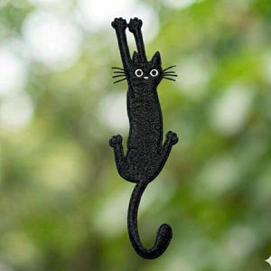 May include: A rustic wooden sign with the text "Welcome to our home" in white lettering. The sign features a distressed finish and a simple, inviting design, perfect for entryway decor.