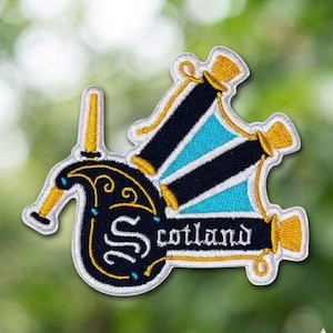 May include: A white ceramic mug with a black handle and the text "But First, Coffee" in a handwritten style. The mug is on a white surface. The mug is 4 inches tall.