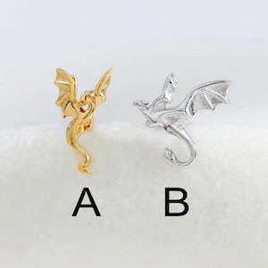 Piercing de cartílago con forma de hélice y diseño de dragón volador, con cierre de presión y rosca interna, en plata de ley.