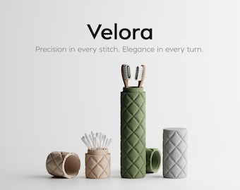 May include: The image displays a collection of quilted containers and cases. A tall green case holds two toothbrushes. Other containers are beige and gray, one holding cotton swabs. The word "Velora" is at the top, with the text "Precision in every stitch. Elegance in every turn."