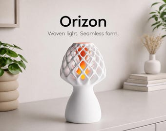 May include: A white, mushroom-shaped lamp with a lattice shade, illuminating a warm orange glow. The lamp is labeled "Orizon" with the text "Woven light. Seamless form."