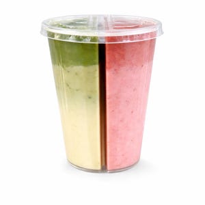 May include: A clear plastic cup divided into two sections, each filled with a different smoothie. One side has a layered green and yellow smoothie, the other a pink smoothie. The cup has a clear plastic lid.