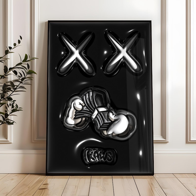 May include: A rectangular black wall art piece featuring a glossy, three-dimensional relief design. The artwork displays two large silver X shapes at the top, a central silver graphic of cartoon-style gloved hands, and the text KAWS at the bottom.