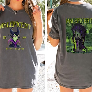 May include: Grey t-shirt with a graphic of Maleficent, a Disney villain, with the text "MALEFICENT" and "EST. 1959 DISNEY VILLIAN". The back of the shirt has a larger graphic of Maleficent with additional text.