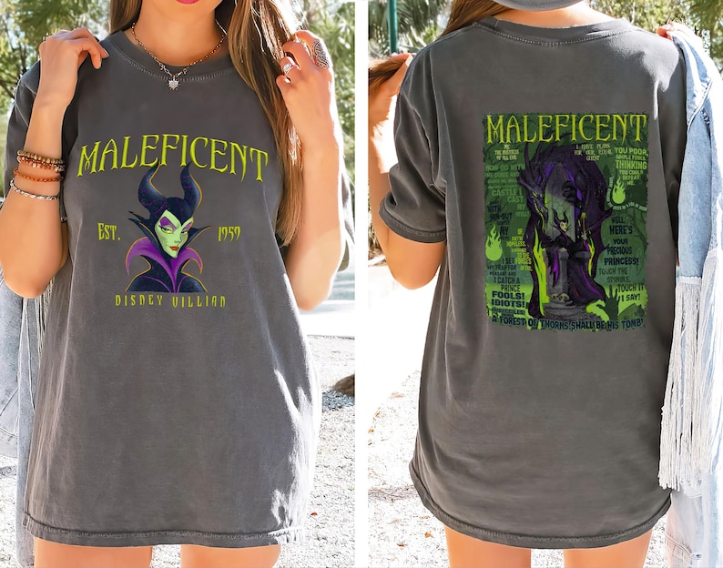 May include: Grey t-shirt with a graphic of Maleficent, a Disney villain, with the text "MALEFICENT" and "EST. 1959 DISNEY VILLIAN". The back of the shirt has a larger graphic of Maleficent with additional text.