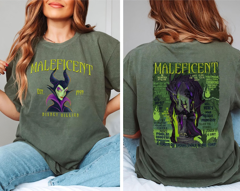 May include: Olive green t-shirt with the word "Maleficent" and a graphic of the Disney villain. The front also shows "Est. 1957" and "Disney Villain". The back of the shirt has a larger graphic of Maleficent with text.