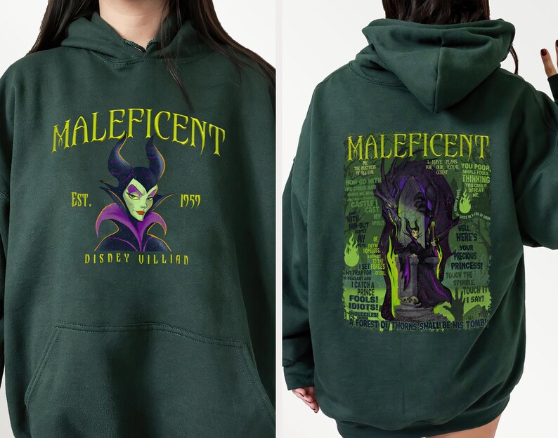 May include: Dark green hoodie with the word "MALEFICENT" in yellow, and a graphic of the Disney villain. The front design includes "EST. 1959" and "DISNEY VILLIAN". The back displays a larger graphic of Maleficent with text.