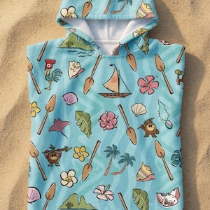 May include: A light blue hooded towel poncho featuring a repeating pattern of tropical motifs including wooden oars, palm trees, pink hibiscus flowers, seashells, a sailboat, a rooster, a stingray, a small pig, and island landscapes.