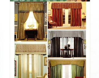 May include: A Simplicity 4098 Christopher Lowell Collection sewing pattern envelope featuring four distinct window treatment designs. Each design displays various styles of curtains, drapes, and valances in different colors, textures, and fabric patterns.