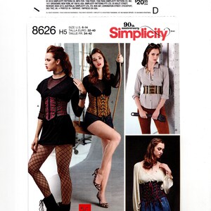 May include: Simplicity sewing pattern 8626 H5 for corsets in sizes 6-14. The envelope displays four variations of corsets, including a red plaid design, a leopard print style, a wide buckled belt, and a dark lace-up corset with a long skirt.