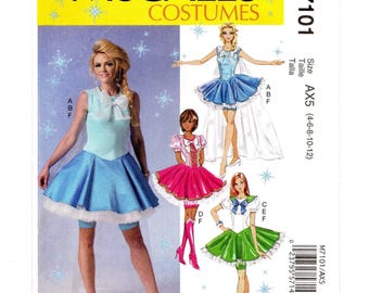 Patrón de costura sin cortar para vestidos de hadas para niñas, tallas 4-12, con corpiño variado, capa y pantalones cortos.