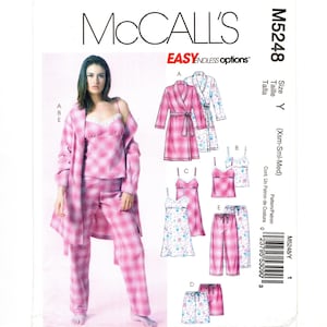 May include: McCall's sewing pattern M5248 for loungewear in size Y, including Xsm-Sml-Med. The envelope features illustrations of a robe, camisole, pants, and shorts in pink plaid and floral prints, with a model wearing the pink plaid set.