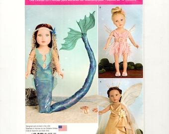 May include: Simplicity pattern 8158 for doll clothes, including a mermaid tail, fairy wings, and a dress. The pattern is designed for 18-inch dolls. The package includes the text "U.S. ONE SIZE" and "Designed and printed in the USA."