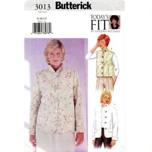 May include: A Butterick sewing pattern, number 3013, featuring a woman in a floral jacket and skirt. The pattern includes designs for jackets and vests. The text "TODAY'S FIT" is also visible.