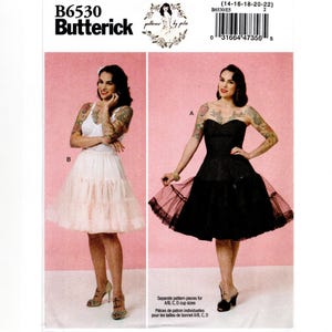 May include: Butterick sewing pattern B6530 for a dress with a sweetheart neckline and a full, layered skirt. The pattern includes options for a light-colored skirt with a white bodice and a solid black dress with a tulle overlay and lace trim.