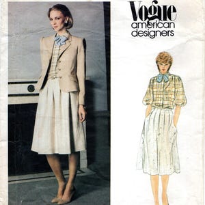 May include: Vogue American Designers sewing pattern envelope featuring a beige blazer, a plaid blouse with a light blue bow tie, and a pleated skirt. The design is shown on a model and as a fashion illustration with text reading Vogue American designers.