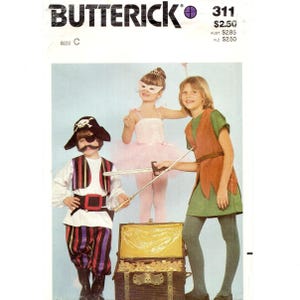 May include: A vintage Butterick sewing pattern featuring children's costumes. The costumes include a pirate, a ballerina, and a character in a green tunic and brown vest. The image shows the costumes and a treasure chest.