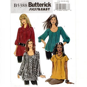 May include: Butterick B5388 Fast & Easy sewing pattern envelope featuring illustrations of four tops. Designs include a long-sleeve maroon cowl neck, a teal scoop neck with gathered sleeves, a short-sleeve yellow cowl neck, and a zebra print tunic.