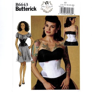 May include: Butterick sewing pattern B6643 for a corset and dress. The envelope features an illustration of a dress with a black and white gingham pattern and a photograph of a white corset with pink ribbon details and a back lace-up closure.