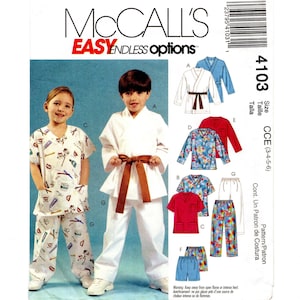 May include: McCall's sewing pattern featuring children's clothing designs. The pattern includes options for a karate uniform, scrubs, and other outfits. The image shows two children modeling the clothing. The pattern number is 4103.