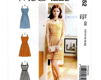 Vestido ajustado talla 12-20 con tirantes cruzados en la espalda, botones en la espalda, patrón de costura sin cortar.