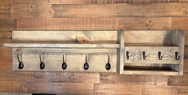 Entryway organizer with five coat hooks and a mail holder