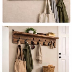 May include: A rustic wooden wall-mounted coat rack with black metal hooks and a top shelf. The shelf holds a potted plant, books, and decorative items. Coats, bags, and scarves hang from the hooks. A wooden bench with shoes is below.