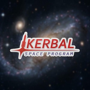 May include: A sticker featuring the words "KERBAL SPACE PROGRAM" in red and white, with a rocket and star design. The background is a blurred image of a galaxy with stars and nebulae.