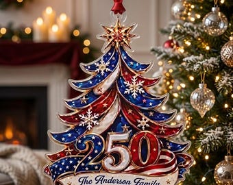 May include: A Christmas tree-shaped ornament featuring red, white, and blue colors with a star at the top, snowflake accents, and the number 250 prominently displayed. A banner at the bottom includes the text The Anderson Family in script.