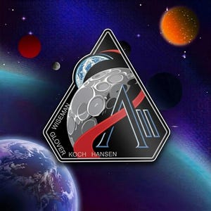 May include: A triangular patch with a black border and a space theme. The patch features a gray moon, a blue and white Earth, and a red stripe. The names Wiseman, Glover, Koch, and Hansen are printed on the patch.