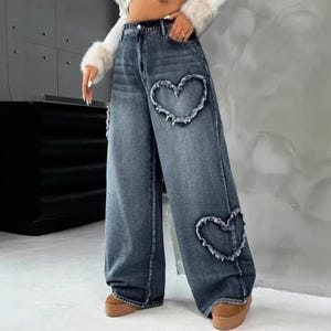 Wide Leg Jeans | Heart Patchwork Denim Pants | Daily Wear | Y2K Streetwear Style

Wide leg denim jeans with heart patch details and vintage Y2K streetwear style