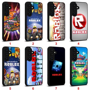 May include: A collection of eight black phone cases featuring various Roblox-themed designs. The cases display the Roblox logo, characters, and phrases like "Inside the World of Roblox" and "Welcome to the Roblox World!"