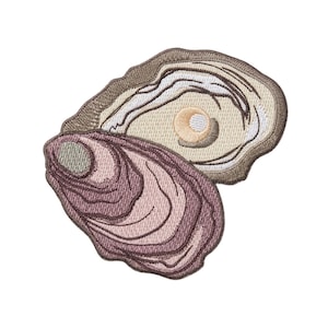May include: Embroidered patch featuring two oyster shells. One shell is open, revealing a pearl, with tan and brown colors. The other shell is closed, with shades of pink and purple. The patch has a textured appearance.