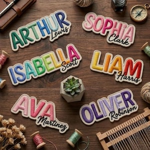 May include: Six embroidered name patches featuring colorful, raised lettering on a white background. The names Arthur Lewis, Sophia Clark, Isabella Scott, Liam Harris, Ava Martinez, and Oliver Robinson are displayed in various vibrant thread colors.