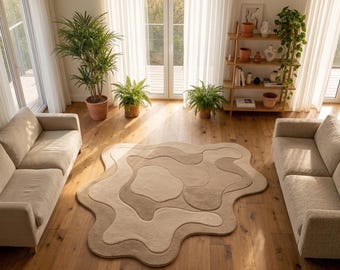 Onregelmatig getuft wollen vloerkleed, tapijt met abstracte contouren, golvend natuurlijk beige woondecoratie