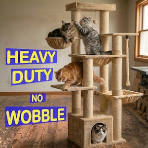 May include: A beige multi-level cat tree with sisal-wrapped scratching posts, multiple platforms, a hanging toy, and a bottom cubby. The text HEAVY DUTY NO WOBBLE is overlaid on the left side. Four cats are positioned on various levels of the structure.