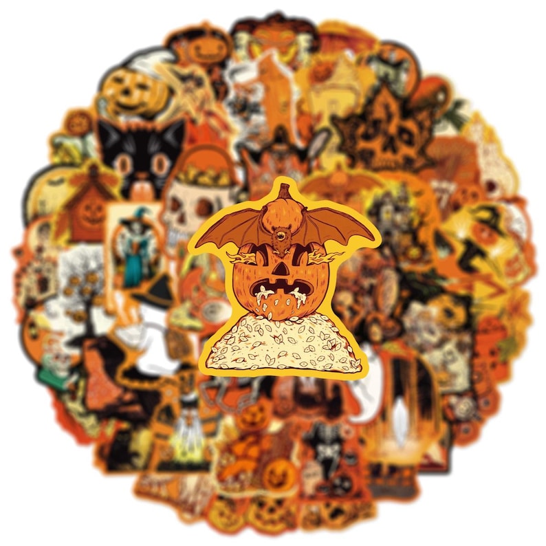May include: A large collection of assorted Halloween-themed stickers featuring orange and black designs. The central sticker depicts a carved pumpkin with bat wings and flames emitting from its eyes, resting on a pile of autumn leaves.