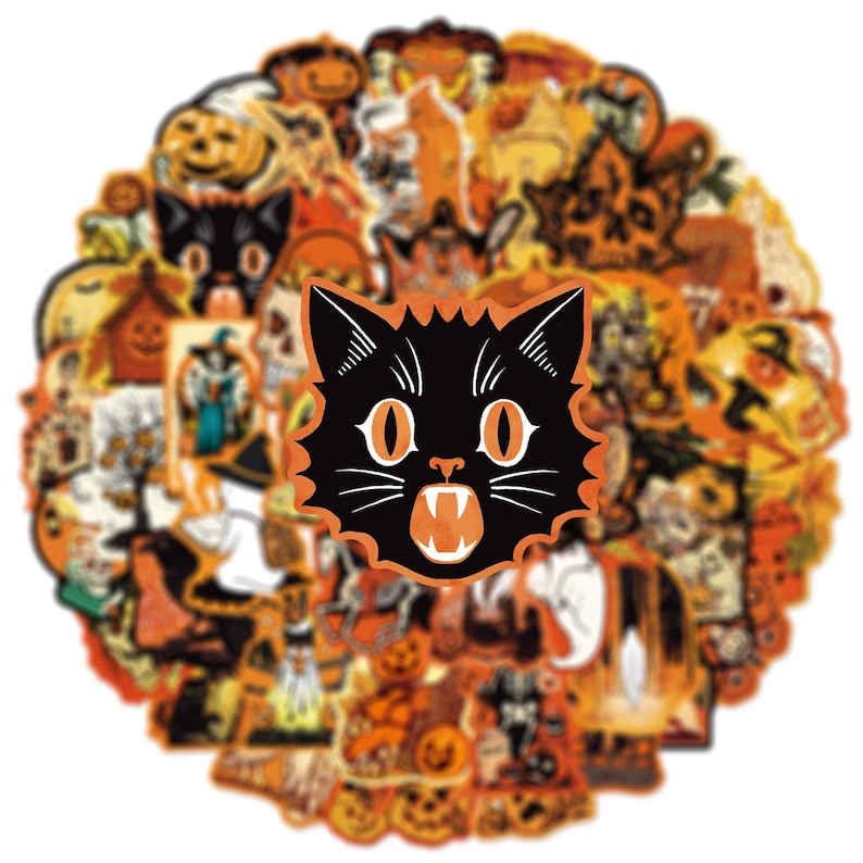 May include: A circular collection of assorted Halloween-themed stickers featuring pumpkins, ghosts, skeletons, and witches. A prominent central sticker depicts a black cat head with orange eyes and an open mouth showing white fangs, outlined in orange.