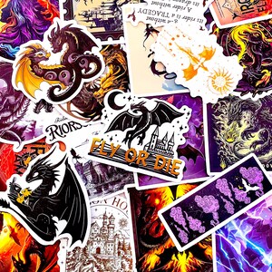 May include: A collection of fantasy-themed stickers featuring dragons, castles, and celestial elements. The stickers showcase various dragon designs in black, gold, and purple, with phrases like "Fly or Die". The overall aesthetic is dark and mystical.