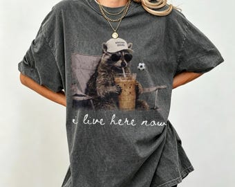 I Live Here Now Soccer Mom Raccoon Camping Iced Coffee T-Shirt, Funny Wild Urban Raccoon Casual Graphic Tee