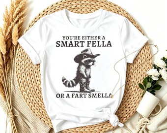 You're Either A Smart Fella Cowboy Raccoon T-Shirt, Funny Western Slogan Wildlife Retro Country Casual Tee
