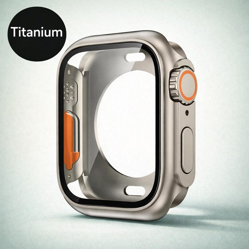 May include: A titanium watch case with a clear screen protector. The case has an orange accent on the side and an orange dial. The word "Titanium" is in a black circle in the upper left corner. The watch case is silver.