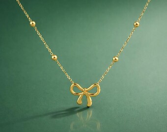 Collar con delicado lazo y nudo – Cadena de acero inoxidable con cuentas, joyería minimalista para el día a día.