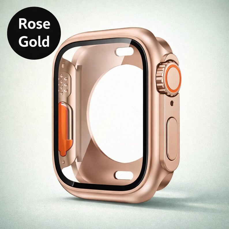May include: Rose gold Apple Watch case with a black border and orange accents. The case has a clear screen protector and a circular button. The text "Rose Gold" is in a black circle in the upper left corner.