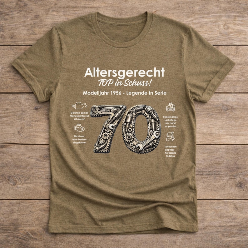 May include: A tan t-shirt with the text "Altersgerecht TOP in Schuss! Modelljahr 1956 - Legende in Serie." The number 70 is designed with gears and tools. Additional text and icons are also present.